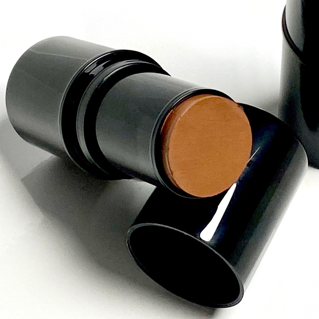 ‘Caffeine’’ a a miracle working bronzer/contour cream stick for your face, eyes and lips.  A CUP OF COFFEE FOR YOUR FACE!